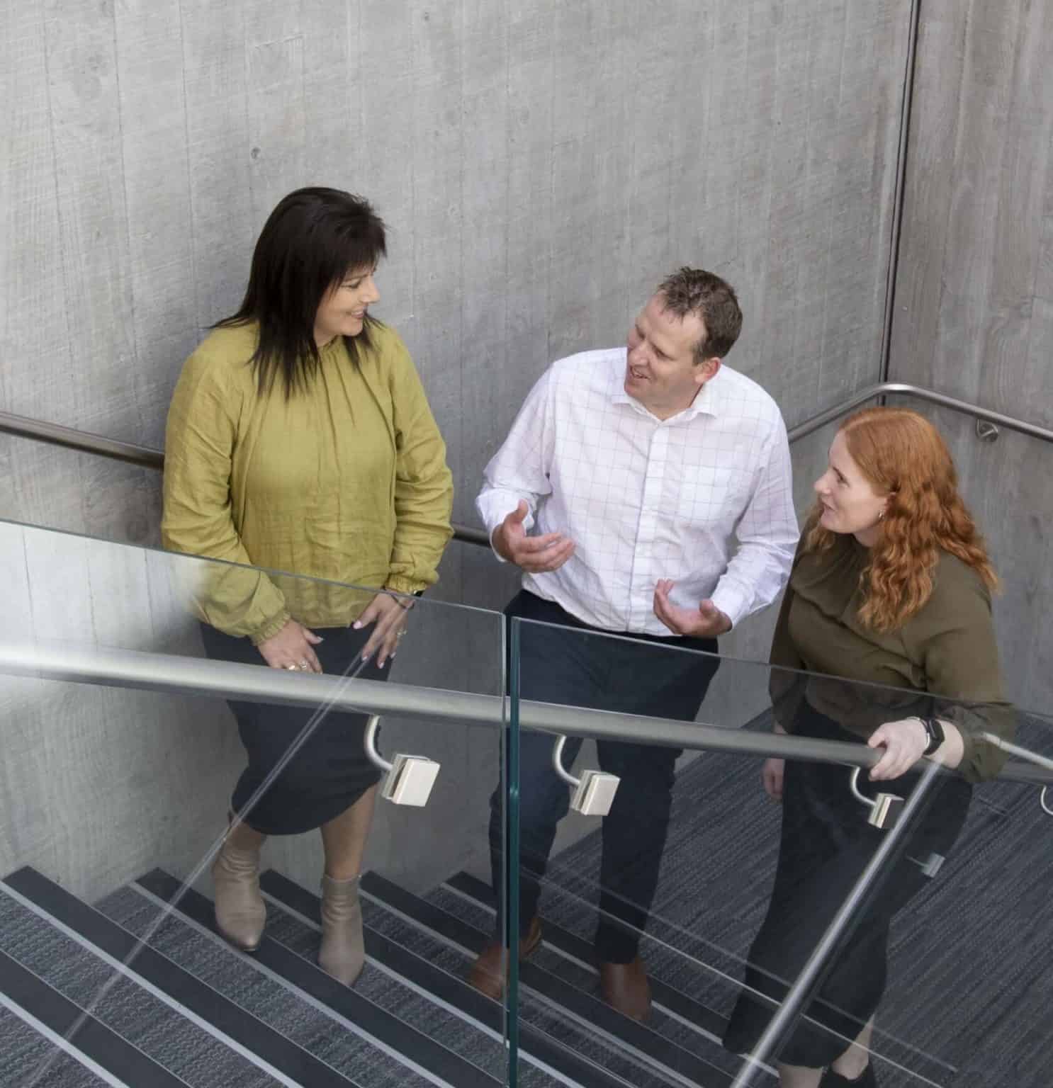 Consultants talking in the stair — McCulloch & Partners Chartered Accountants and Business Advisors in New Zealand